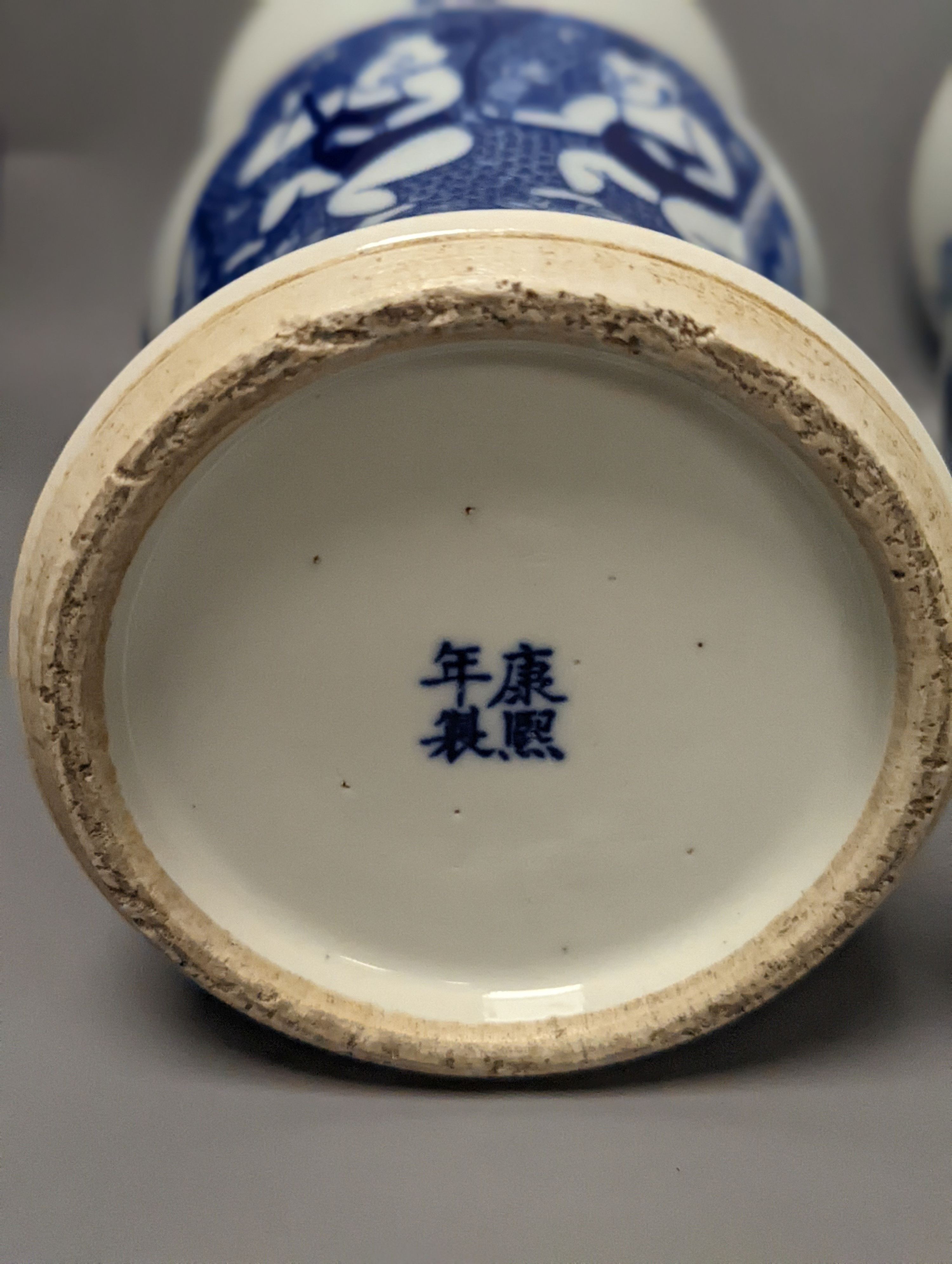 A pair of Chinese blue and white vases on stands and 6 further wood stands. Vases 35cm